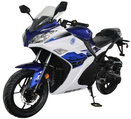 A blue and white motorcycle is parked on the street.