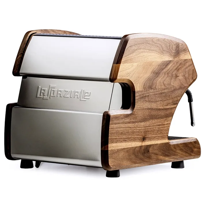 A hand pulling out the front-loading water reservoir of the LUCCA A53 Mini V2 Walnut