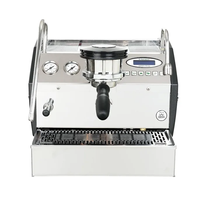 The La Marzocco GS3 Original Automatic connected to a water line, highlighting its direct plumb capability