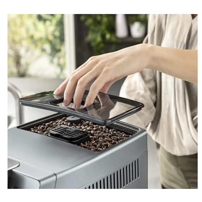 The DeLonghi Dinamica LatteCrema System milk carafe attached to the DeLonghi Dinamica LatteCrema, ready for automatic frothing