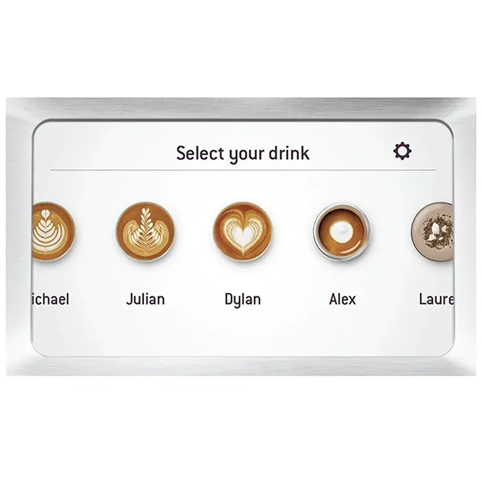 The Breville Oracle Touch Black automatic steam wand perfectly frothing milk in a pitcher, ready for latte art