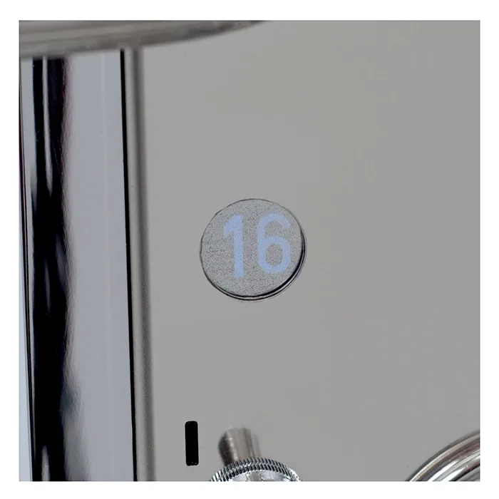 A detailed shot of the E61 group head on the Rocket Espresso Mozzafiato Cronometro V Black, highlighting its robust construction