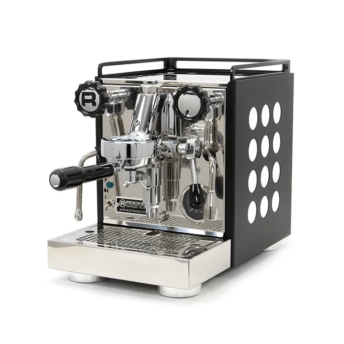 A matte black Rocket Espresso Appartamento Serie Nera White accents, highlighting its polka dot design