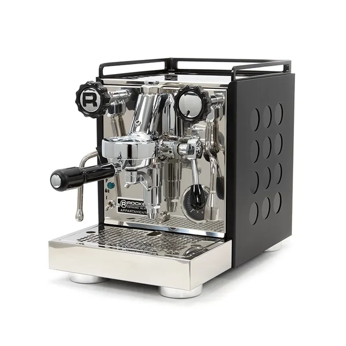 A matte black Rocket Espresso Appartamento Serie Nera with copper accents, highlighting its polka dot design