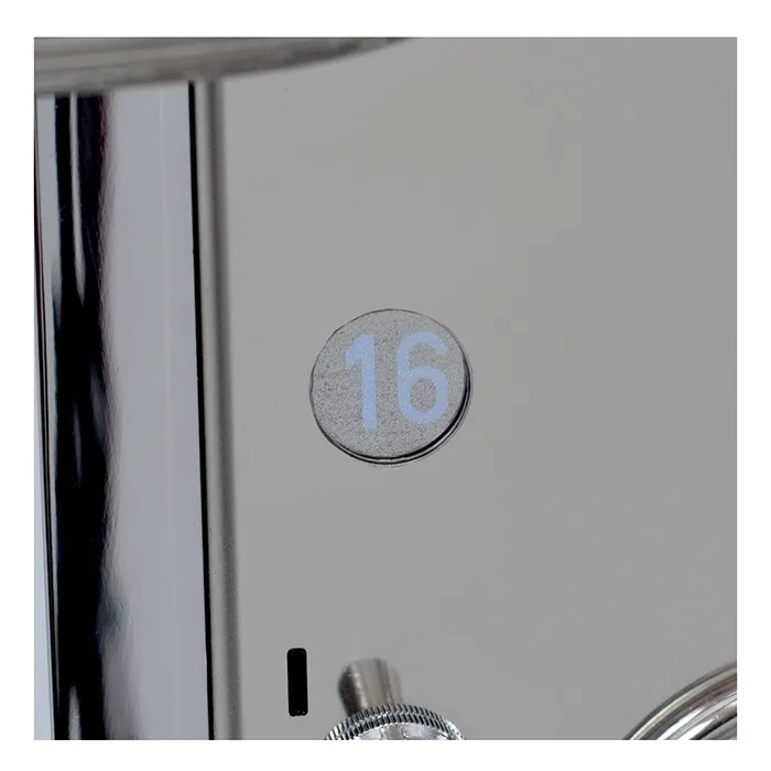 A view of the back or side of the Rocket Espresso Mozzafiato Cronometro R Black, illustrating the connection for direct plumbing to a water line