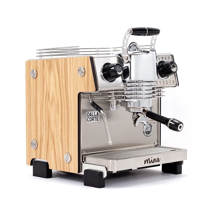 Close-up of the Dalla Corte Mina Espresso Machine Oak right side, displaying the series of lights indicating flow rate stages during extraction