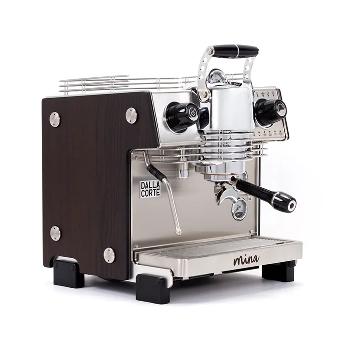A sleek, Dalla Corte Mina Espresso Machine Dark Oak, showcasing its distinctive manual lever (yoke) and modern design