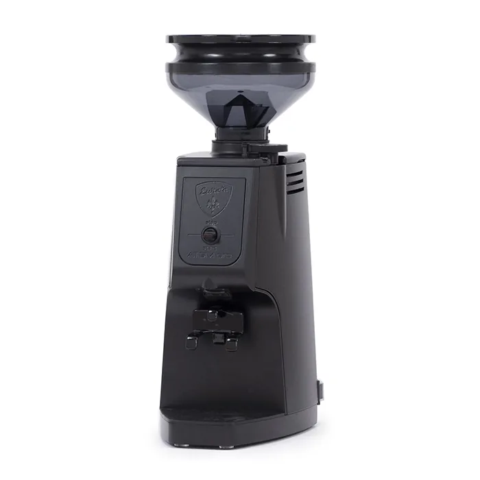 A sleek, Eureka Atom Pro Coffee Grinder Black on a counter, showcasing its compact yet powerful design