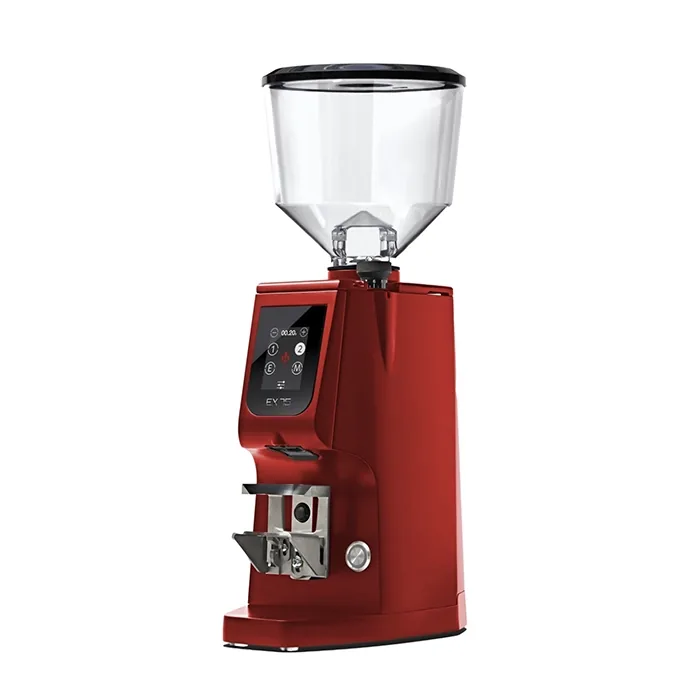 A sleek, Eureka Atom Excellence 75 Red espresso grinder on a countertop, emphasizing its sturdy build and modern appearance