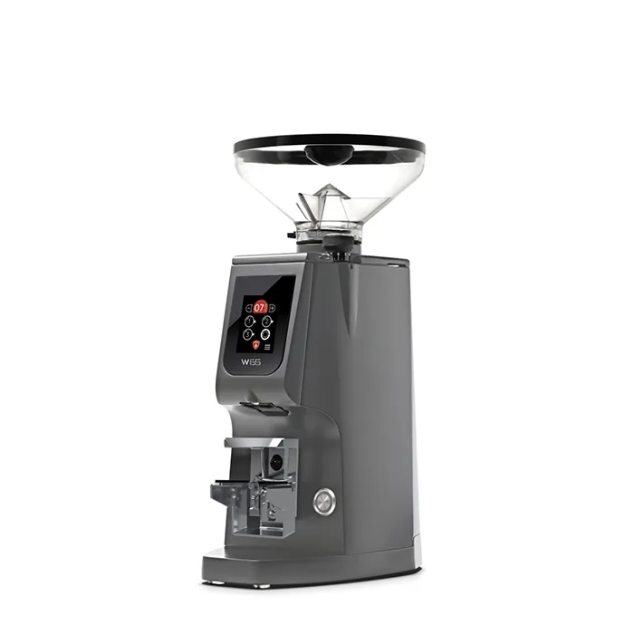 A sleek, Eureka Atom W 65 espresso grinder Grey on a counter, highlighting its compact design
