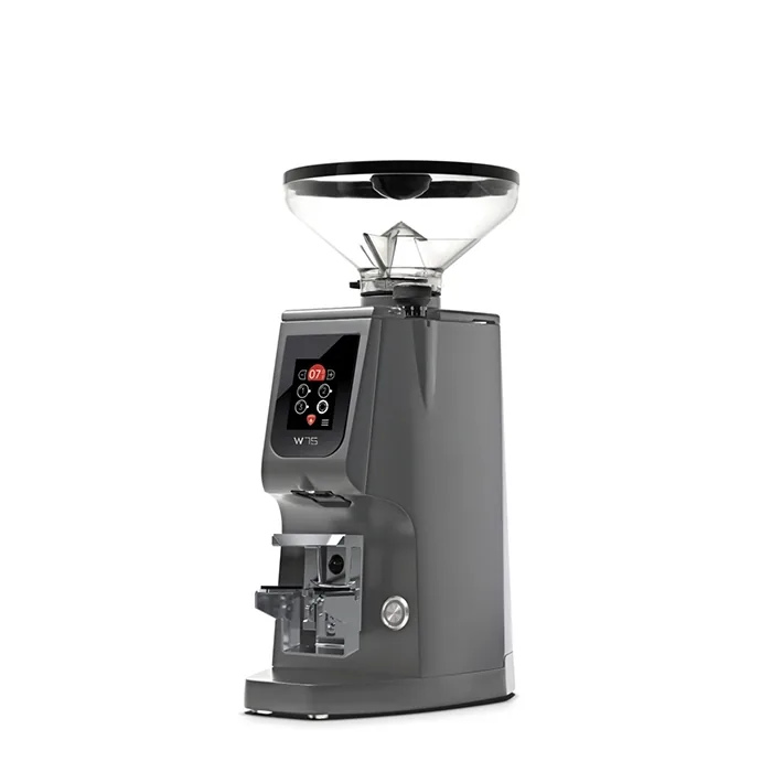 A sleek, Eureka Atom W 75 espresso grinder Grey on a counter, highlighting its compact design
