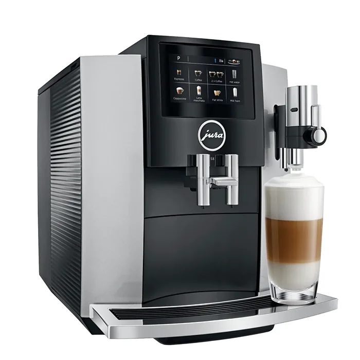 A sleek JURA S8 espresso machine silver, displaying its large color touchscreen and a coffee cup ready for brewing