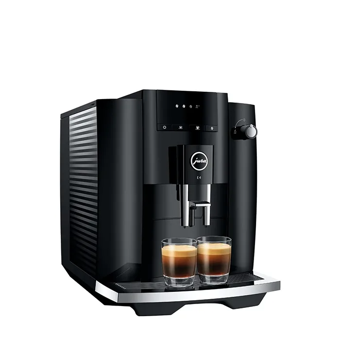 A sleek JURA E4 espresso machine black, showcasing its minimalist design on a kitchen counter