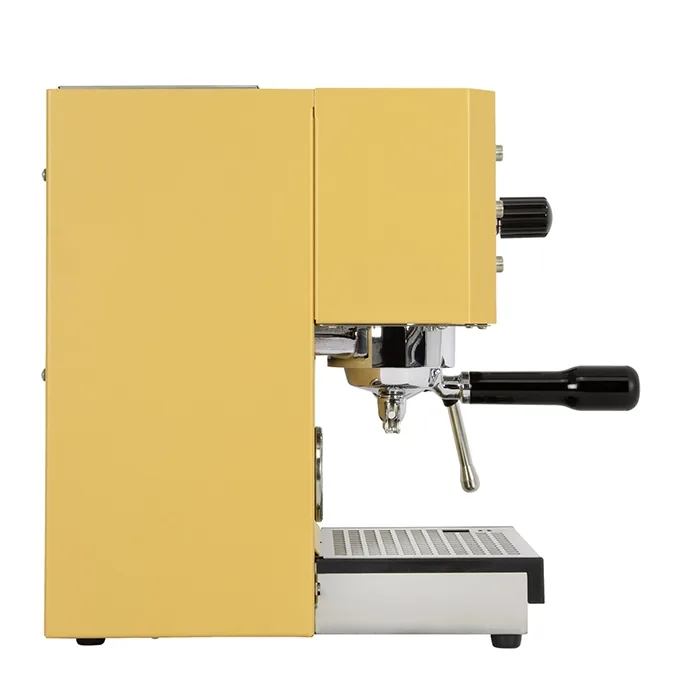 A detailed view of the redesigned, BPA-free plastic drip tray of the Profitec GO Espresso Machine Yellow, emphasizing its increased capacity and cutouts