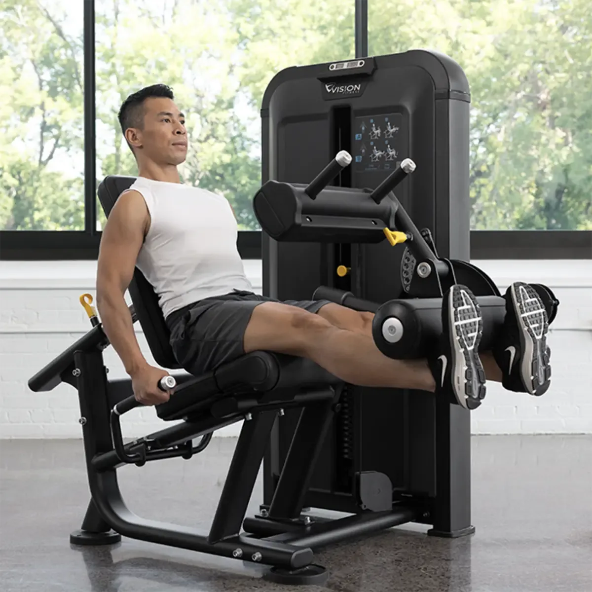 Vision Keystone Leg Extension Commercial lower body machine with ratcheting back pad and ankle pad
