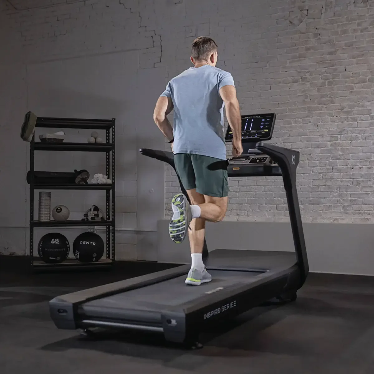 Inspire Series T7 Treadmill console with workout feedback and Bluetooth audio speakers