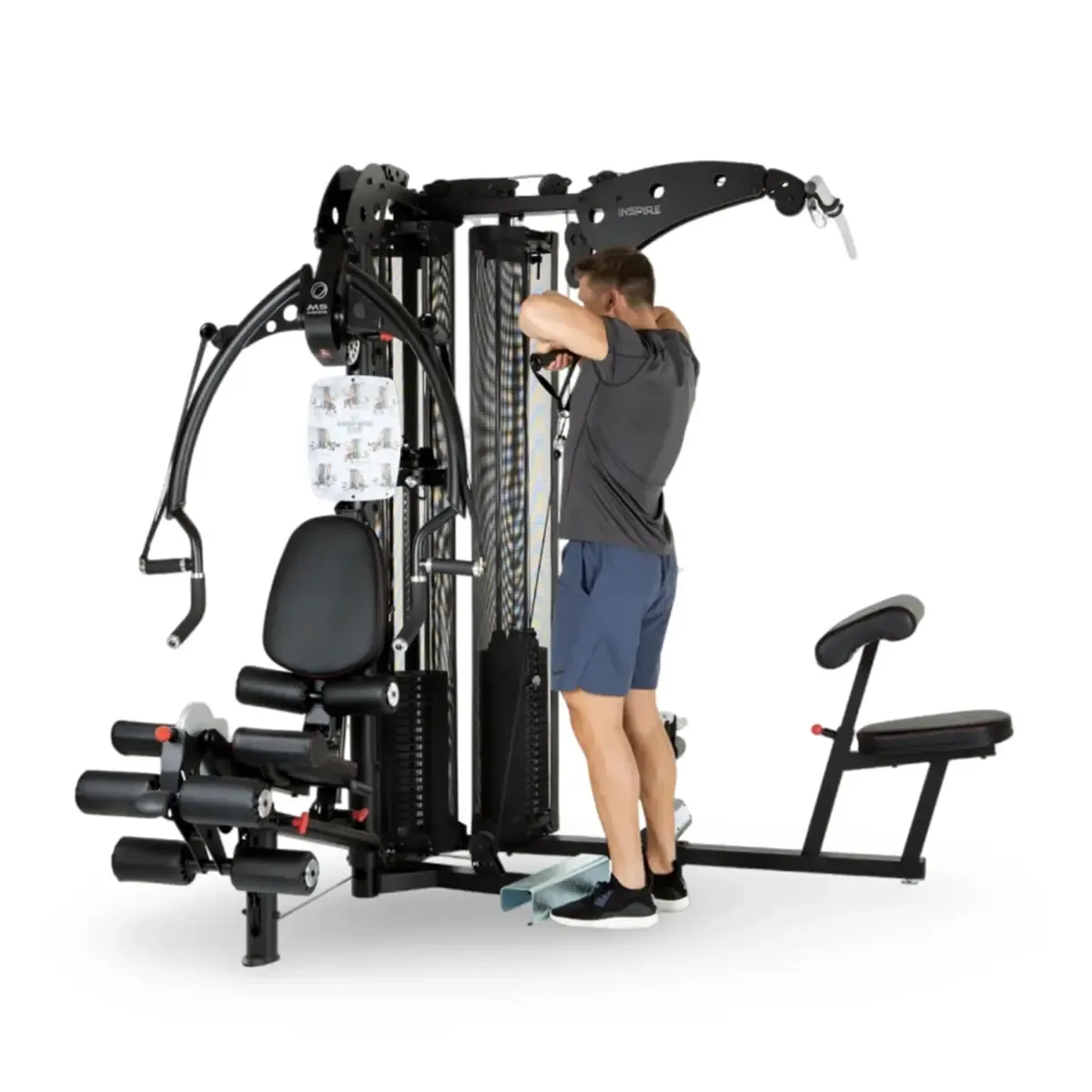 Inspire Fitness M5 Multi-user home gym with seated leg curl extension and free movement handles