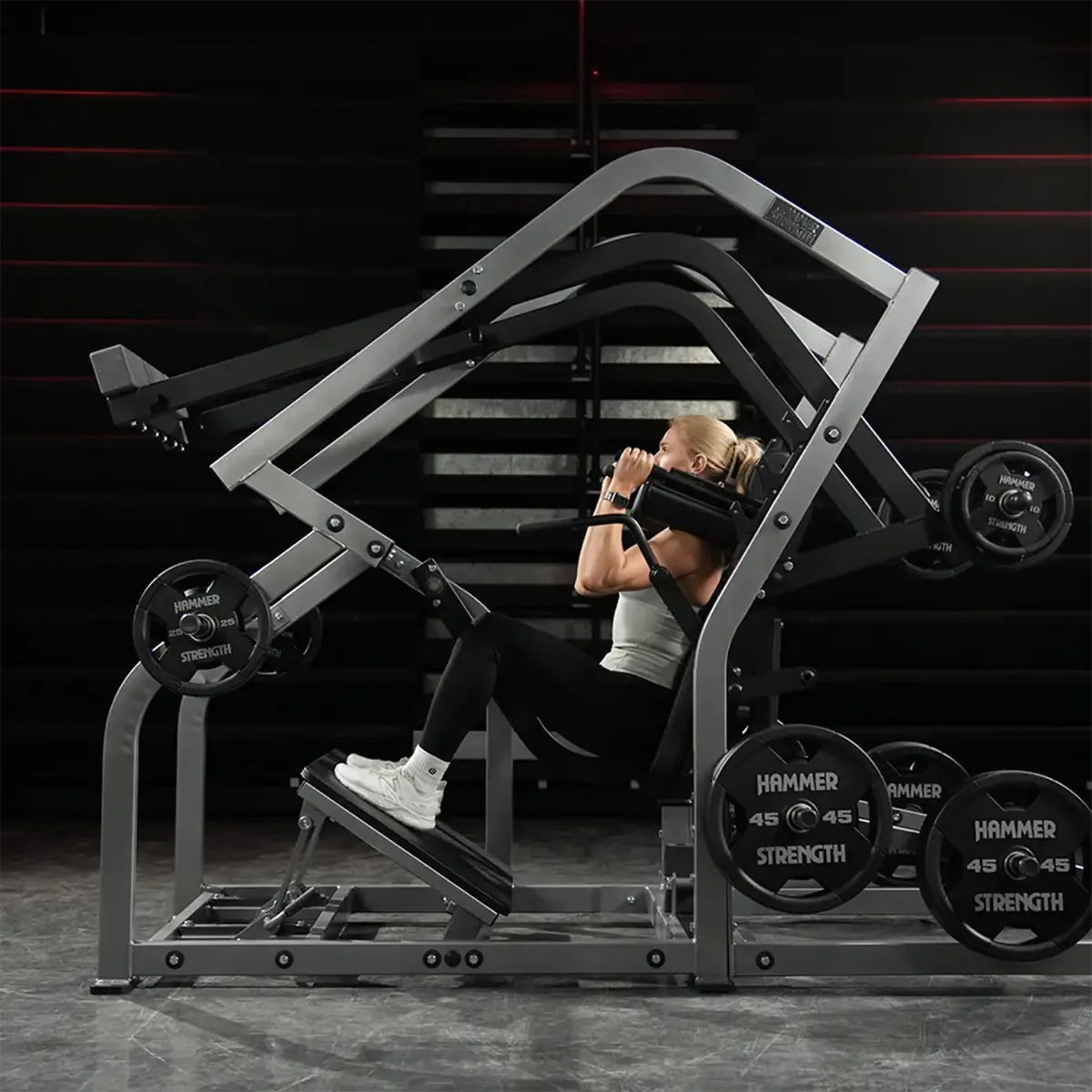 Hammer Strength Plate-loaded pendulum squat with adjustable foot platform and band pegs