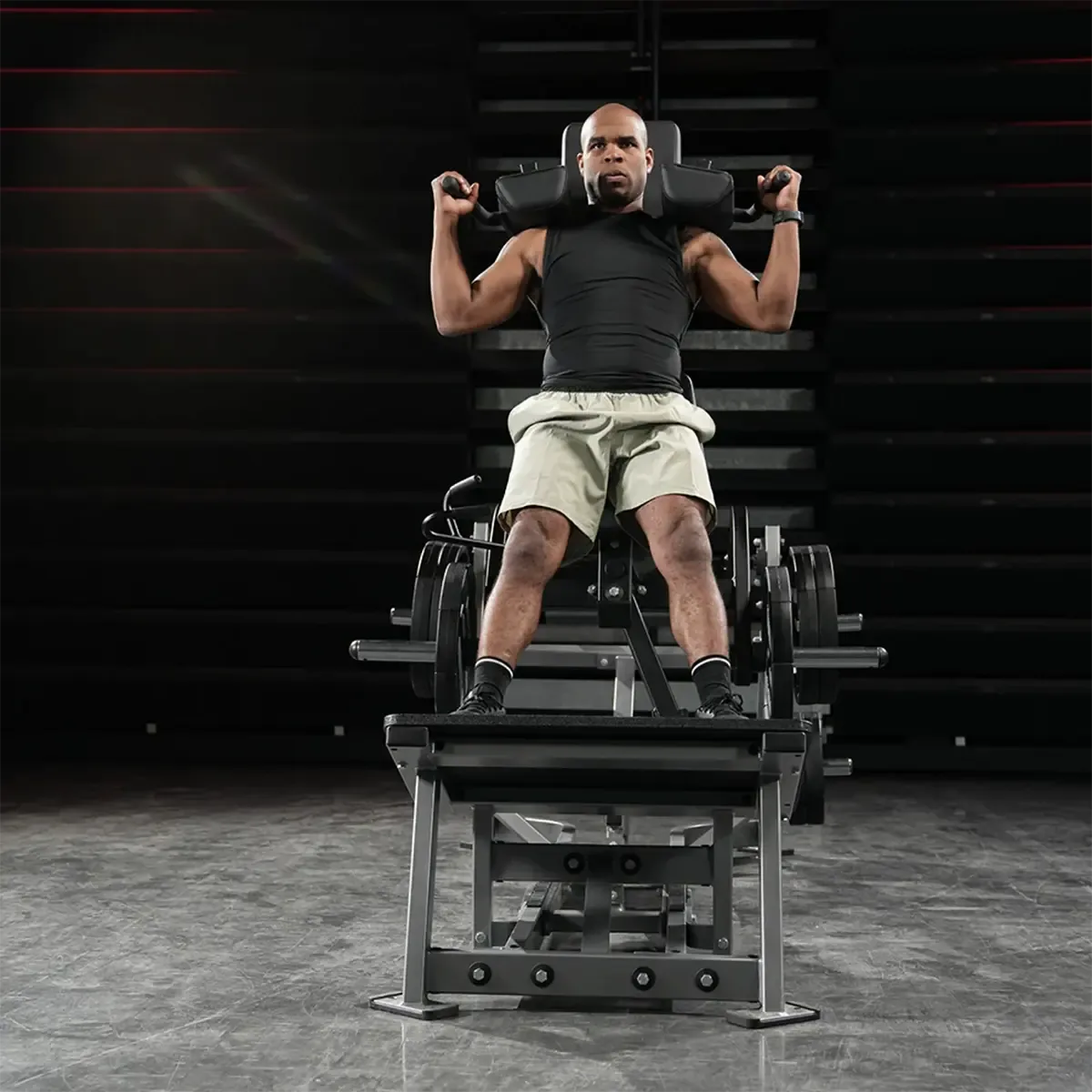 Hammer Strength squat machine with push-pull racking mechanism