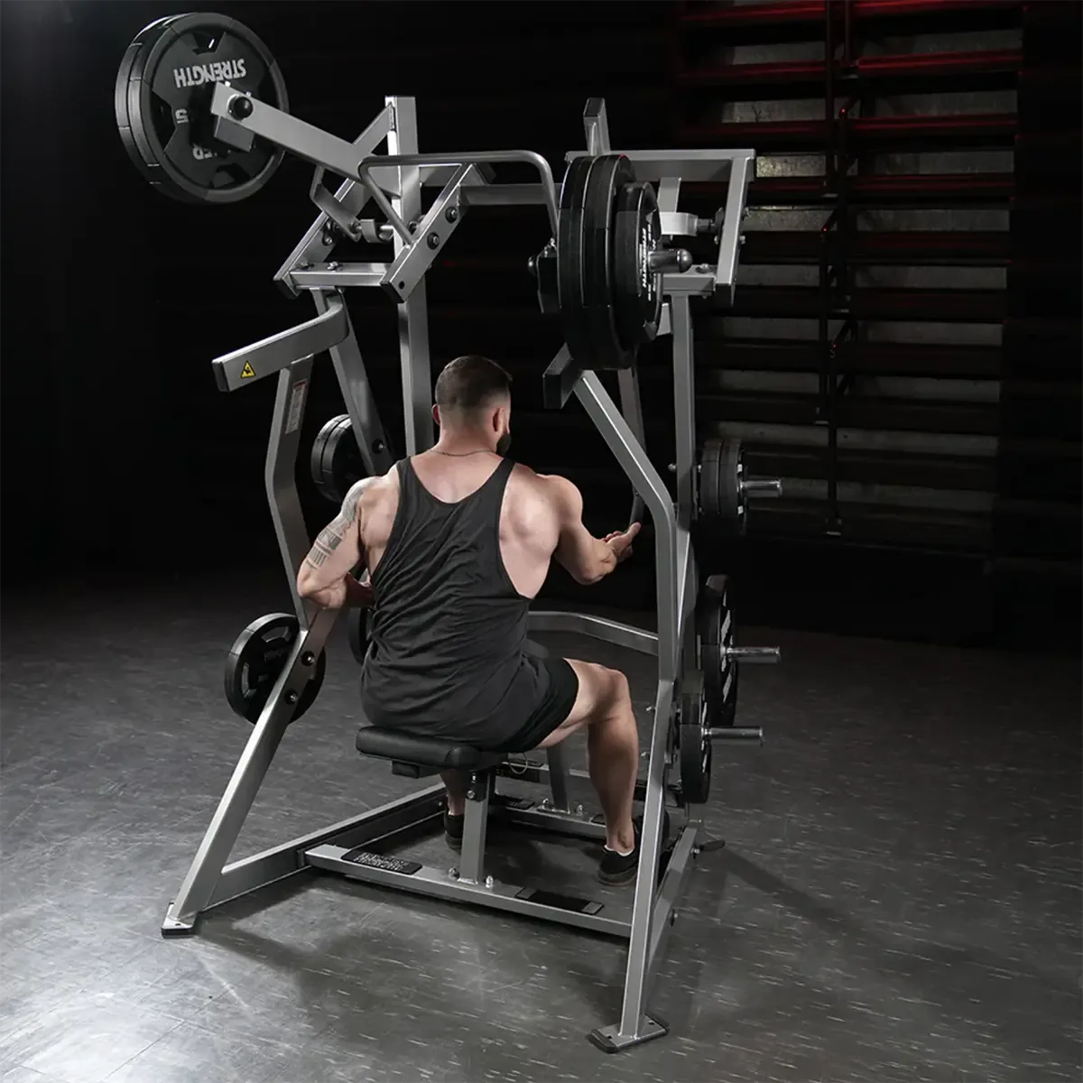 Hammer Strength back machine with overhead pivot and chest pad