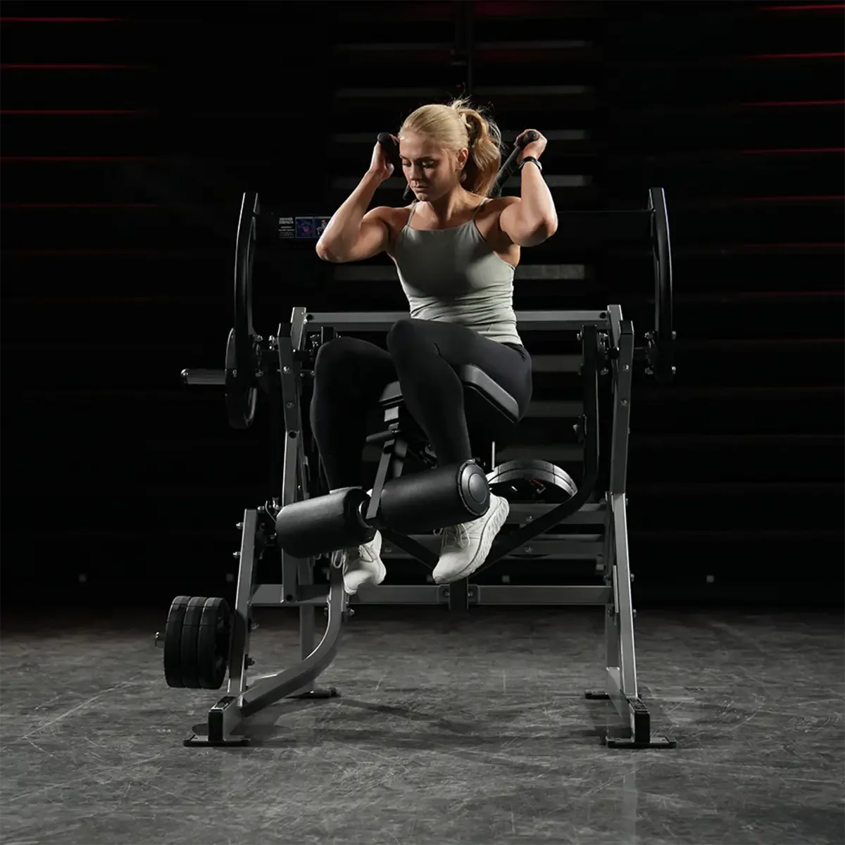 Hammer Strength core machine with over-shoulder grips
