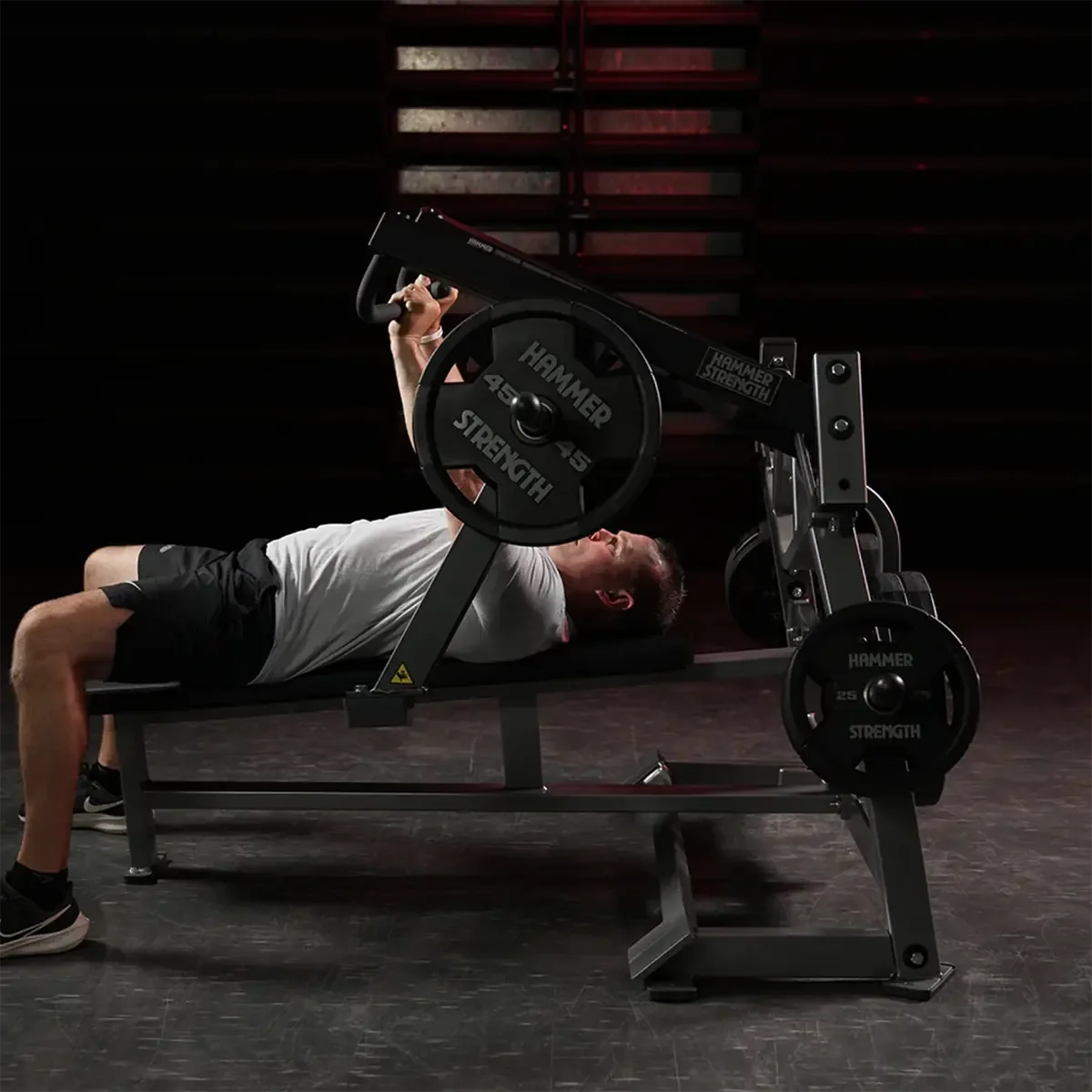 Hammer Strength bench press with ergonomic handles and storage horns