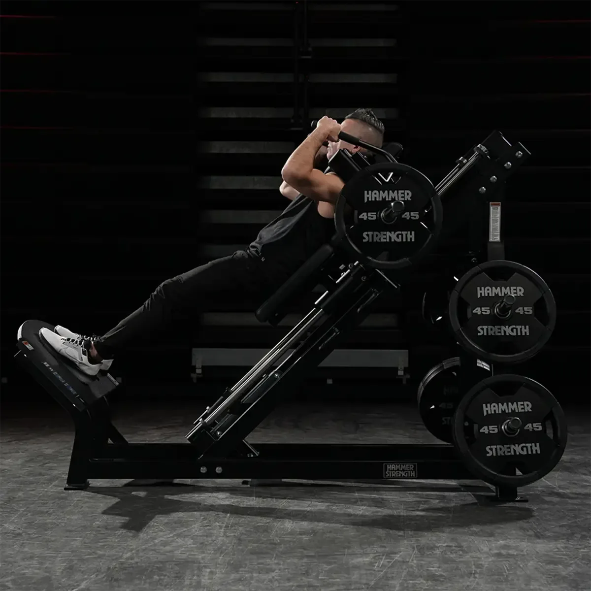 Hammer Strength Plate-loaded hack squat machine with adjustable non-slip platform