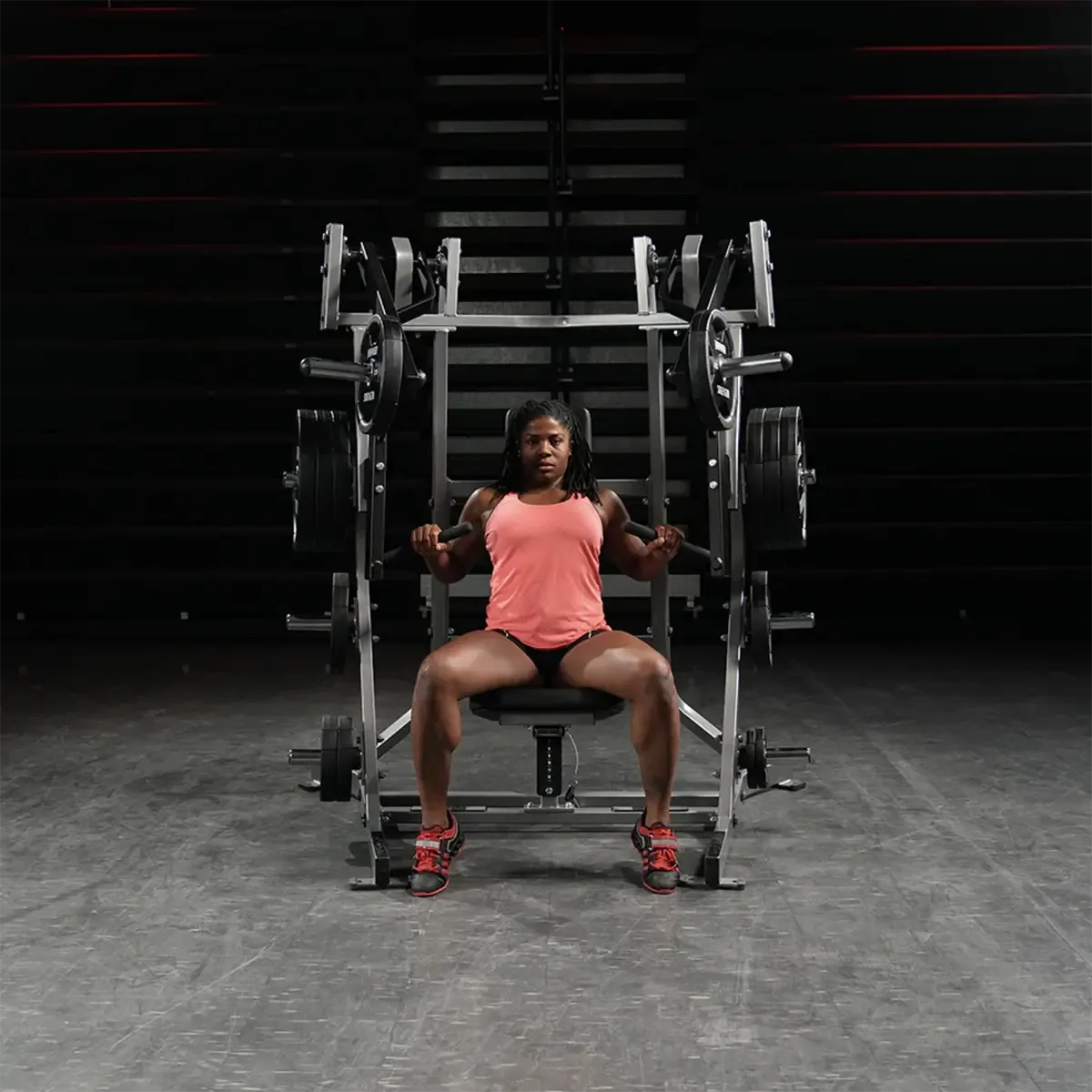 Hammer Strength Seated bench press machine with ergonomic handles and independent arms
