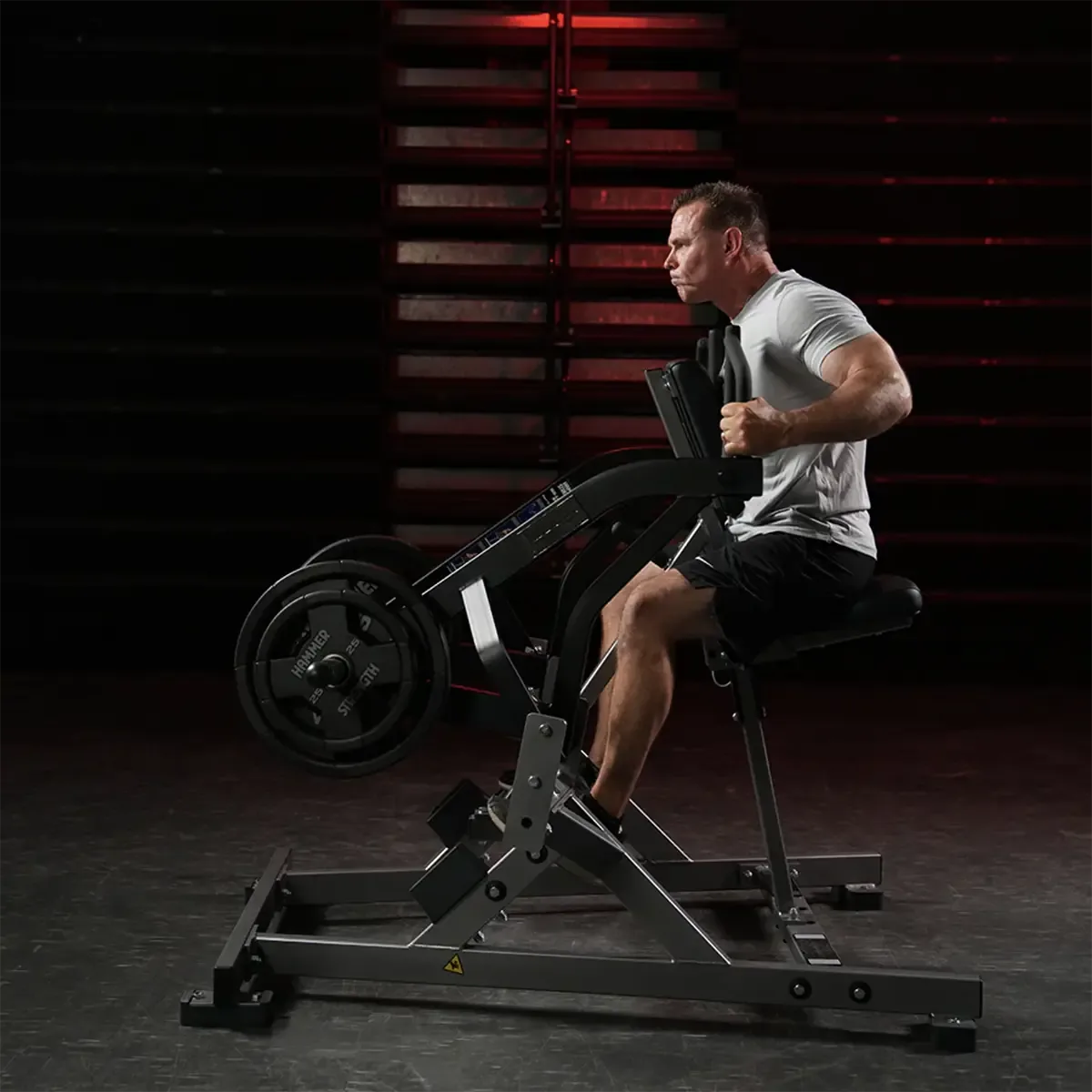 Chest-supported row machine with independent work arms and multi-grip handles