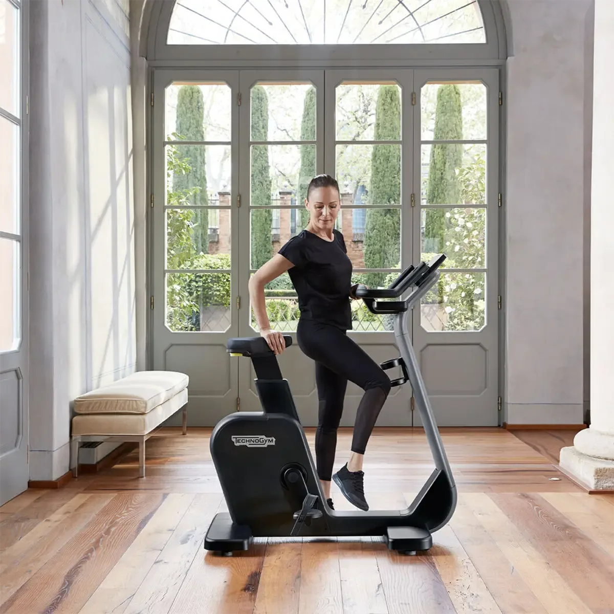 Technogym Cycle Compact exercise bike with wide seat and Bluetooth connectivity